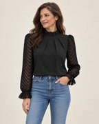 Nathalie | Bluse mit Stehkragen und transparenten Ärmeln – am Valtor-Modell