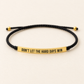 Robin – schwarzes Armband mit goldfarbenem Schriftzug-Element